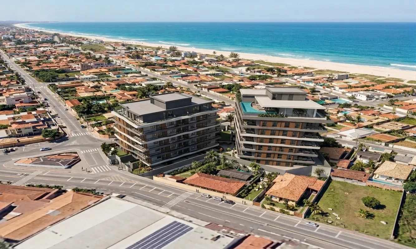 Vista aérea das duas torres com o bairro e o mar de Itaúna ao fundo. Perspectiva ilustrada.